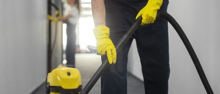 front-view-man-cleaning-indoors